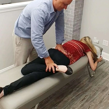 Dr. Jon Pinkston, 1 on 1 stretching with patient on table
